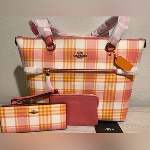 New (used once) 3 piece Pink Taffy Plaid matching Coach set!